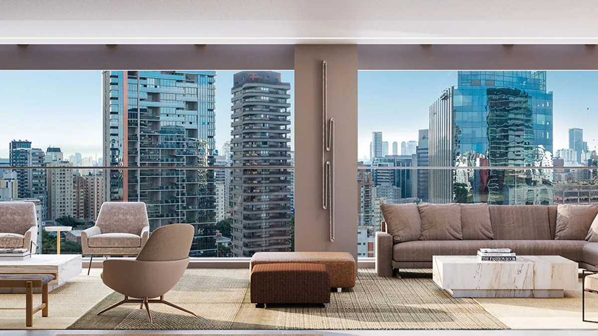 Sala ampla de apartamento com iluminação, climatização e ambientes integrados para automação